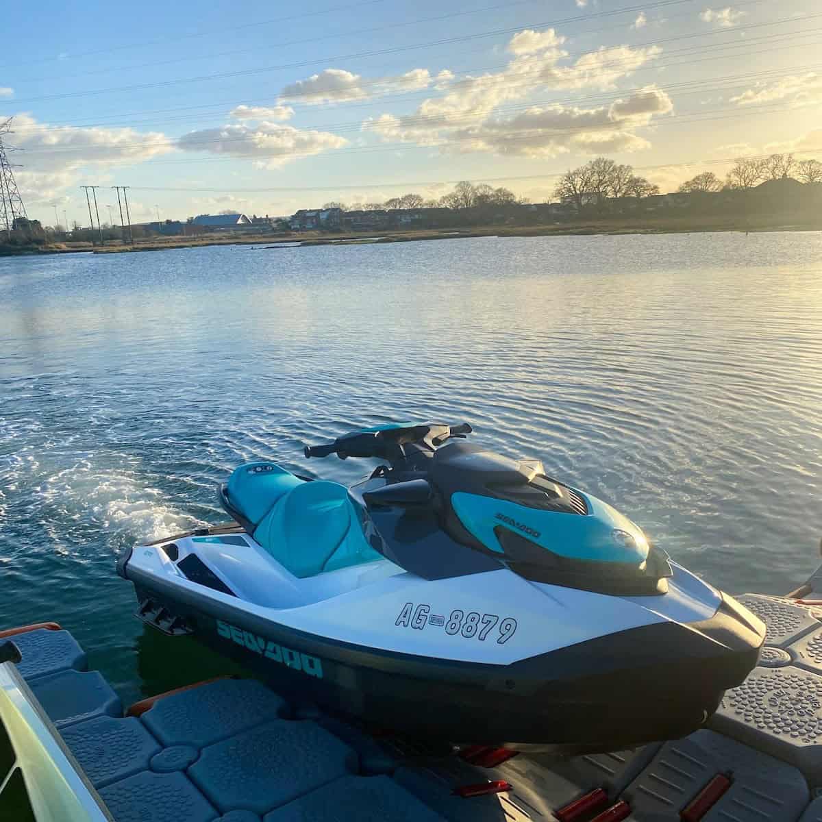 Jet Ski on Calm Water at Sunset.
