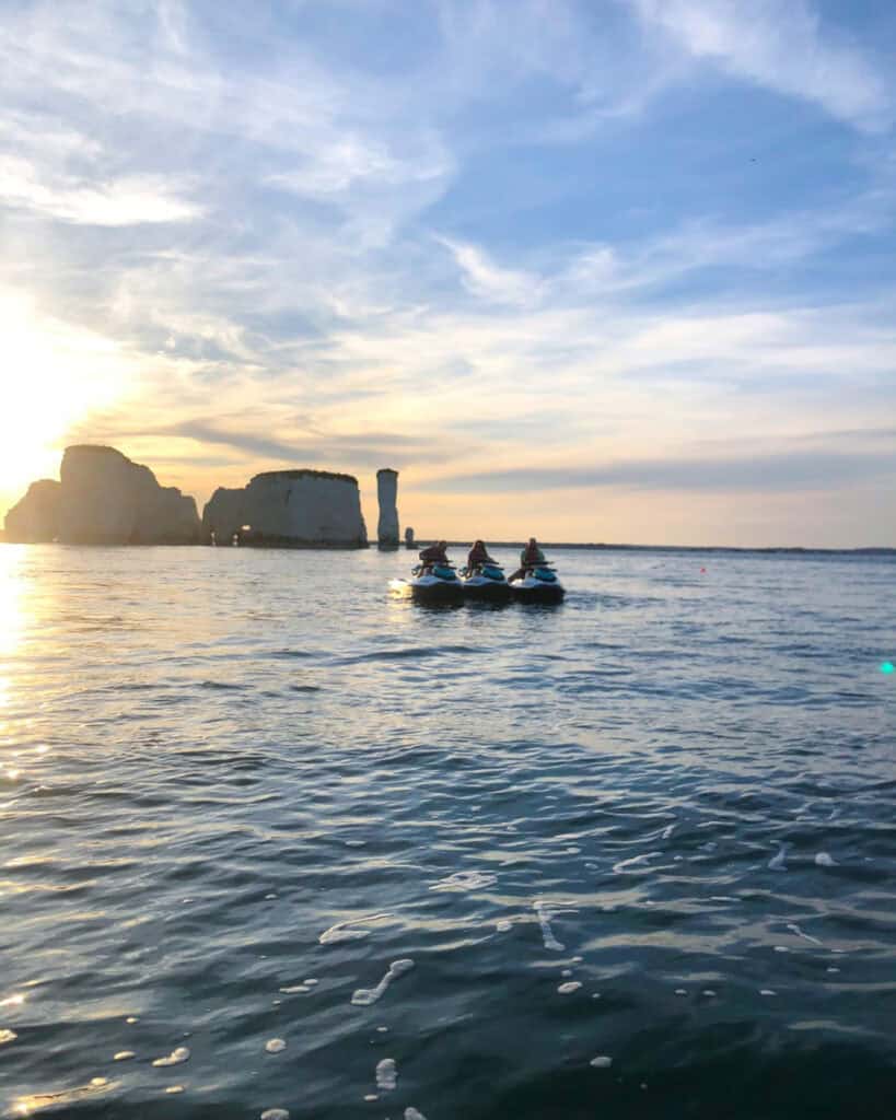 Jet Ski riders enjoying the sunset at South Coast.