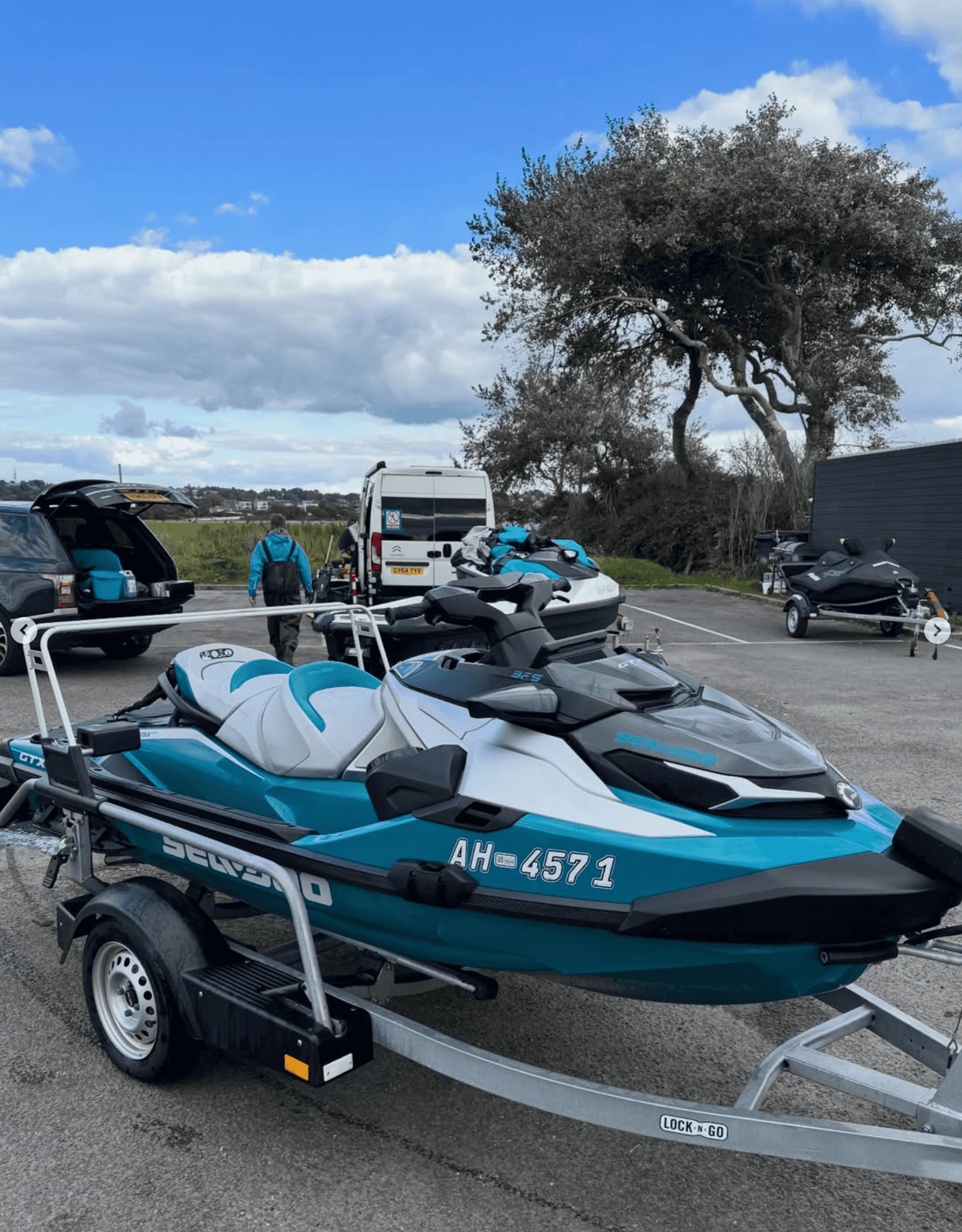 Jet ski on trailer at the marine, ready for water adventure.